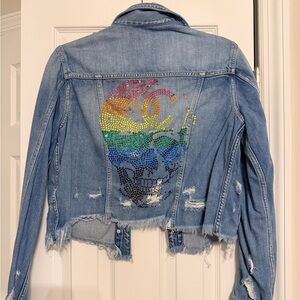 Hidden Denim Jean jacket with skull detail on back size medium.